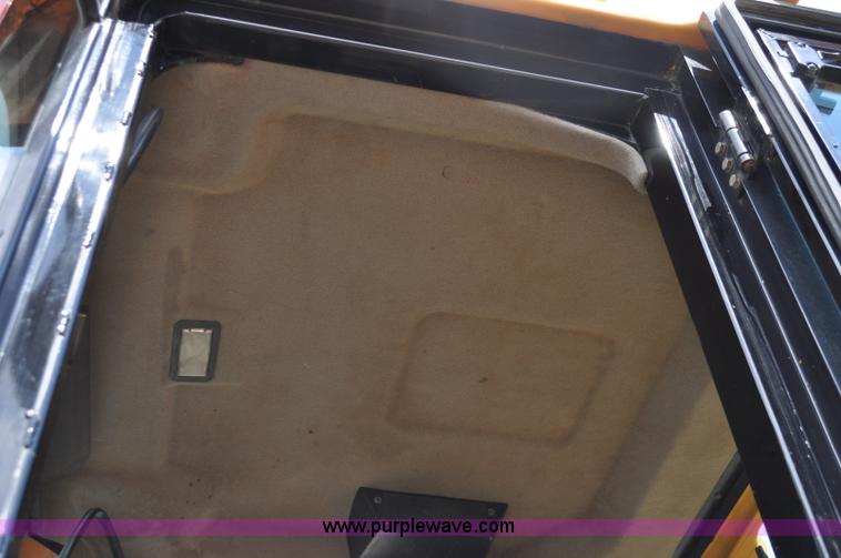 image for item G7410 2005 Caterpillar 930G integrated tool carrier