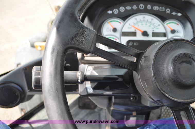 image for item G7410 2005 Caterpillar 930G integrated tool carrier