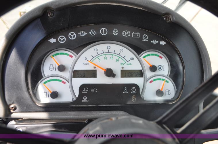 image for item G7410 2005 Caterpillar 930G integrated tool carrier