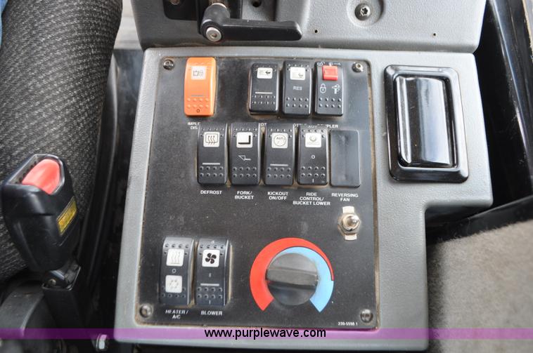 image for item G7410 2005 Caterpillar 930G integrated tool carrier