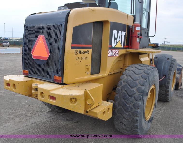 image for item G7410 2005 Caterpillar 930G integrated tool carrier