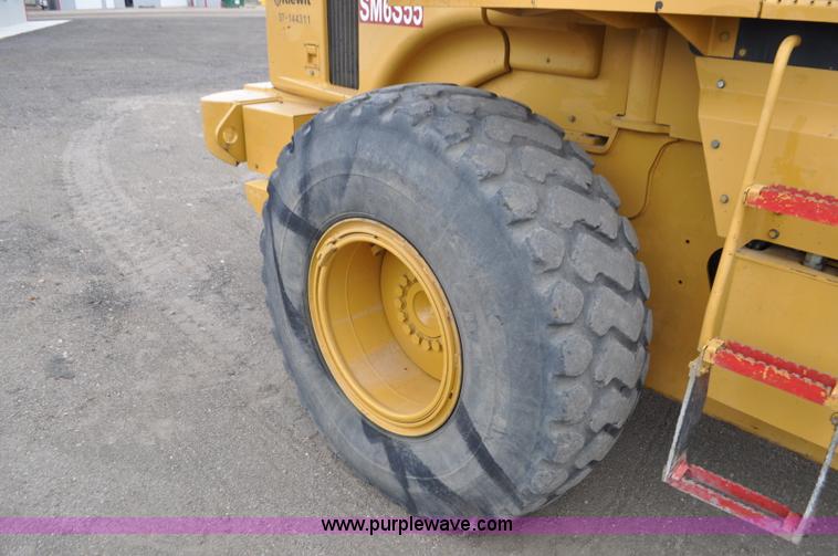 image for item G7410 2005 Caterpillar 930G integrated tool carrier