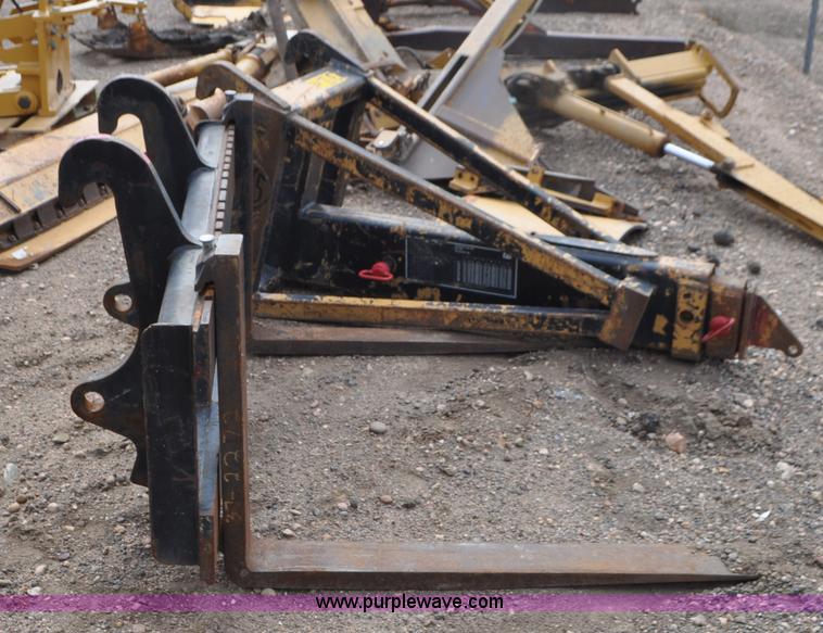 image for item G7410 2005 Caterpillar 930G integrated tool carrier