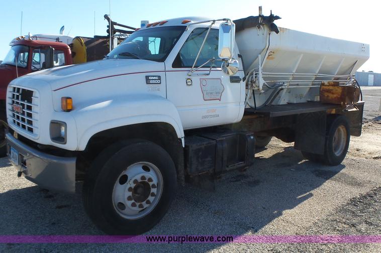 image for item K2190 1999 GMC C7500 spreader truck