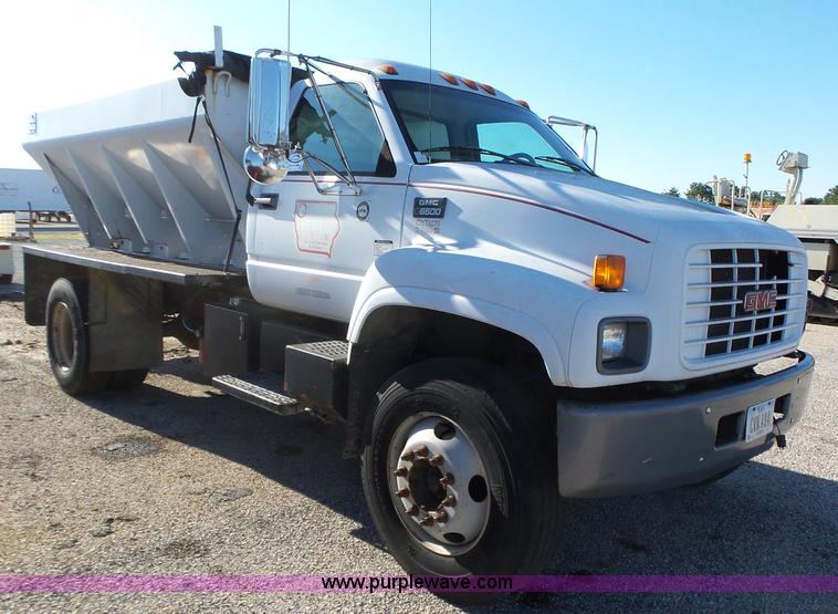 image for item K2190 1999 GMC C7500 spreader truck