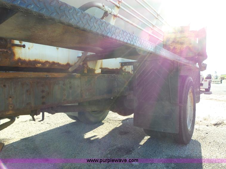 image for item K2190 1999 GMC C7500 spreader truck