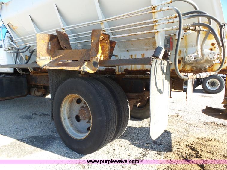 image for item K2190 1999 GMC C7500 spreader truck