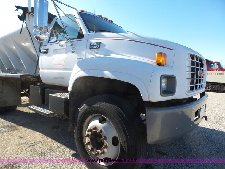 image for item K2190 1999 GMC C7500 spreader truck