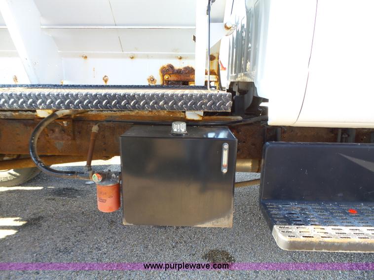 image for item K2190 1999 GMC C7500 spreader truck