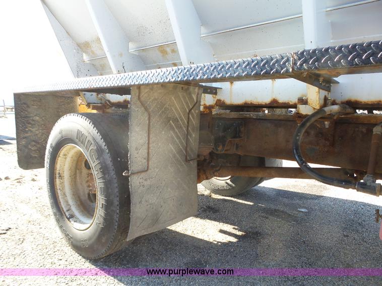 image for item K2190 1999 GMC C7500 spreader truck