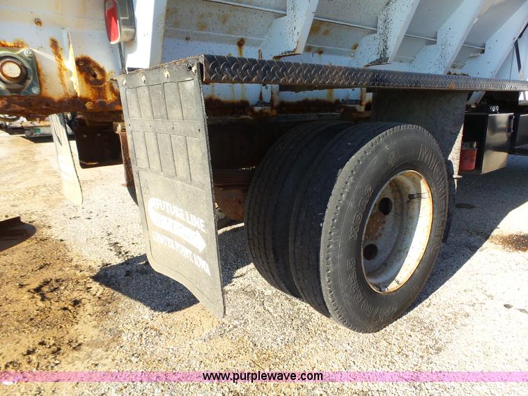 image for item K2190 1999 GMC C7500 spreader truck