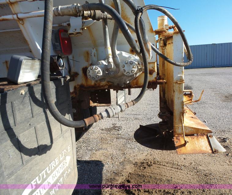 image for item K2190 1999 GMC C7500 spreader truck