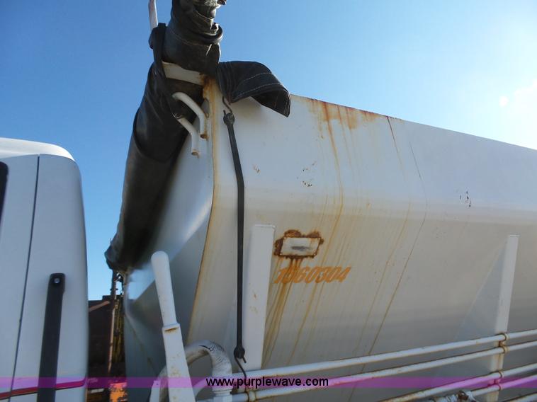 image for item K2190 1999 GMC C7500 spreader truck