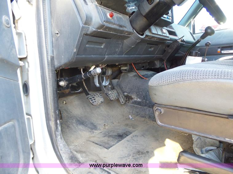 image for item K2190 1999 GMC C7500 spreader truck