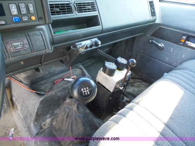 image for item K2190 1999 GMC C7500 spreader truck