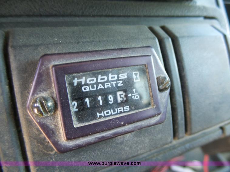 image for item K2190 1999 GMC C7500 spreader truck