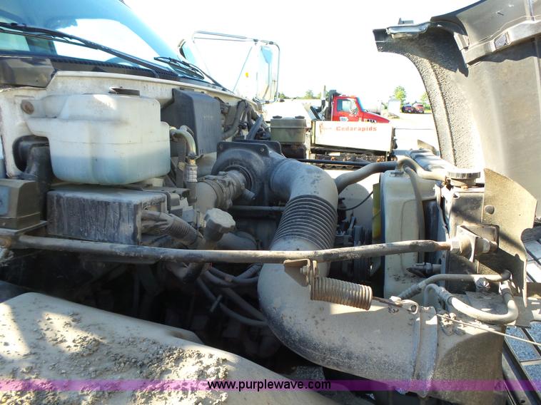 image for item K2190 1999 GMC C7500 spreader truck