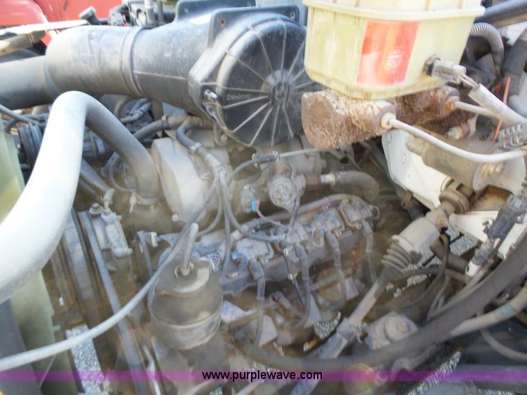 image for item K2190 1999 GMC C7500 spreader truck