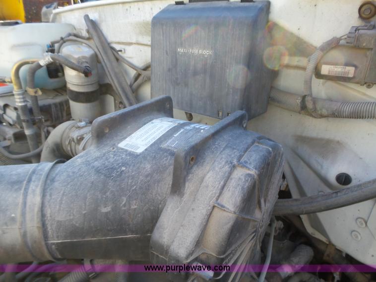 image for item K2190 1999 GMC C7500 spreader truck