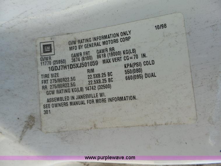 image for item K2190 1999 GMC C7500 spreader truck