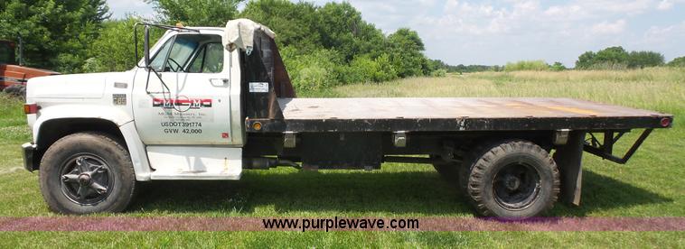 image for item K4593 1977 Chevrolet C65 dump flatbed truck