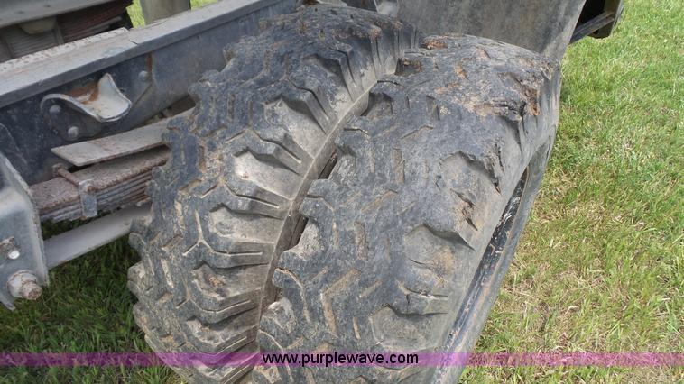 image for item K4593 1977 Chevrolet C65 dump flatbed truck