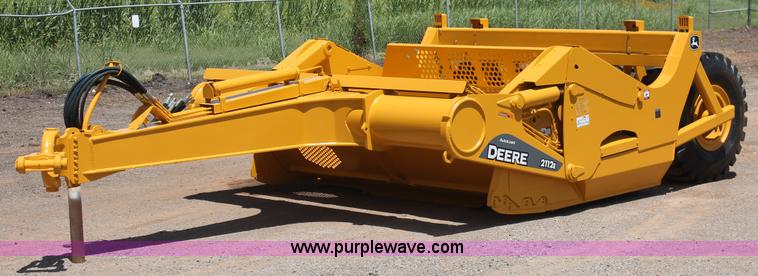 image for item K8795 2013 John Deere 2112E scraper