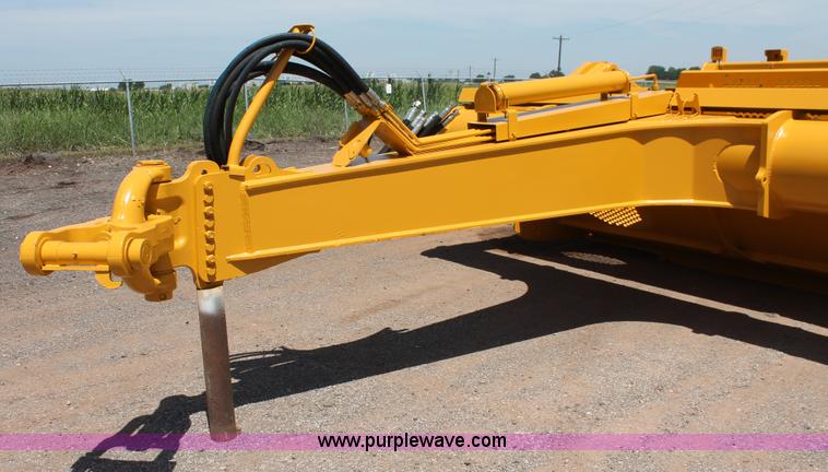 image for item K8795 2013 John Deere 2112E scraper