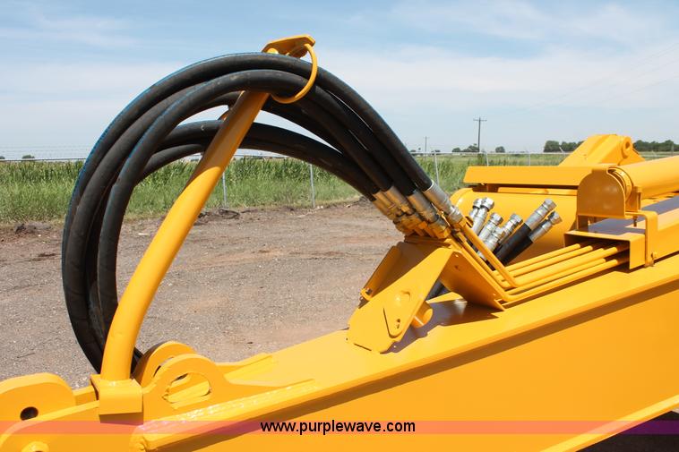 image for item K8795 2013 John Deere 2112E scraper