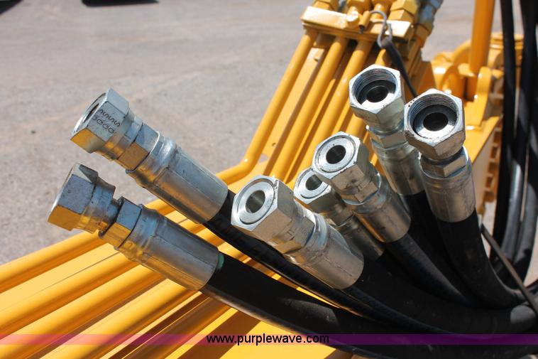 image for item K8795 2013 John Deere 2112E scraper