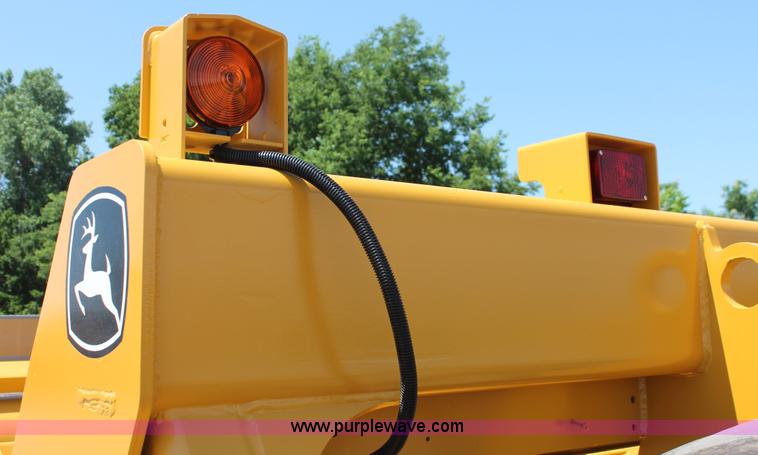 image for item K8795 2013 John Deere 2112E scraper