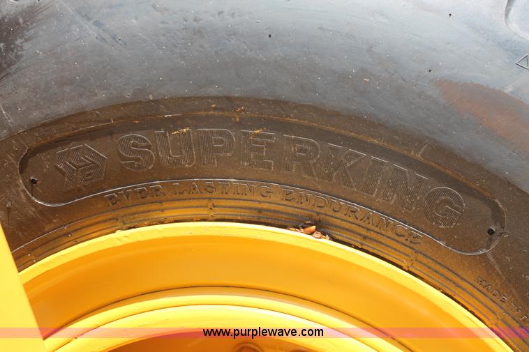 image for item K8795 2013 John Deere 2112E scraper