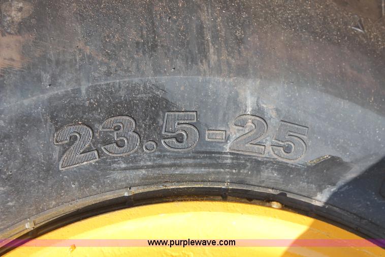 image for item K8795 2013 John Deere 2112E scraper