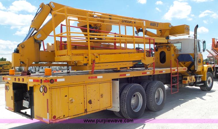 image for item L2000 1995 Volvo ACL bridge inspection truck