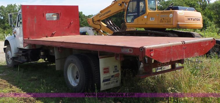 image for item L6106 1994 International 4900 flatbed dump truck