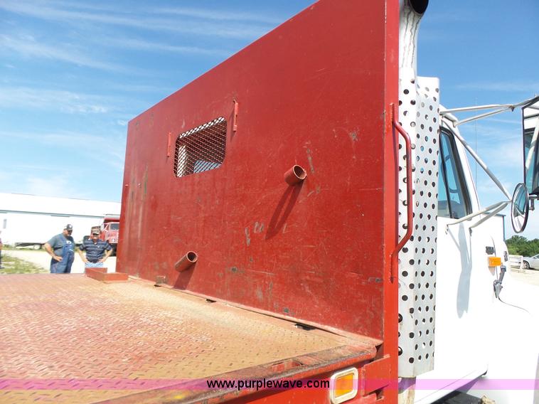 image for item L6106 1994 International 4900 flatbed dump truck