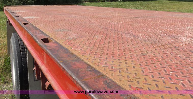 image for item L6106 1994 International 4900 flatbed dump truck