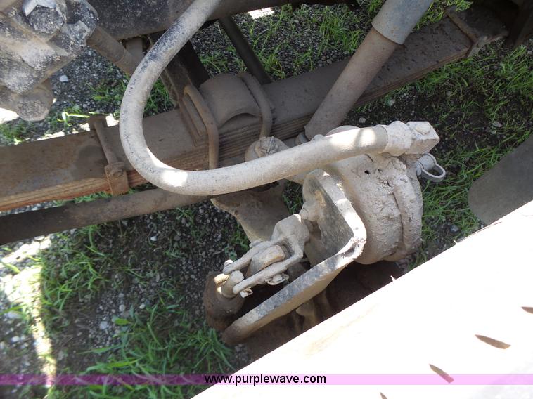 image for item L6106 1994 International 4900 flatbed dump truck