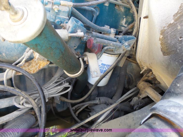 image for item L6106 1994 International 4900 flatbed dump truck