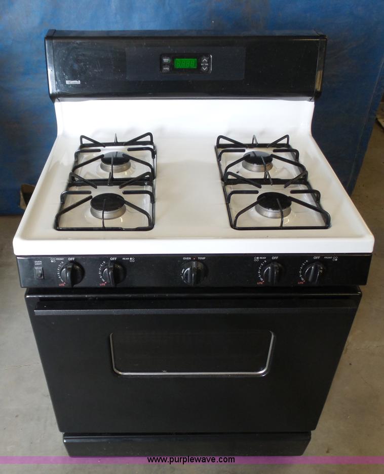 (2) Kenmore gas ranges in Montezuma, KS Item BY9500 sold Purple Wave