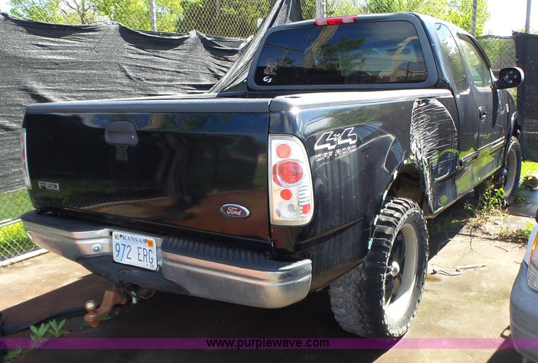 image for item BZ9511 2000 Ford F150 SuperCab pickup truck