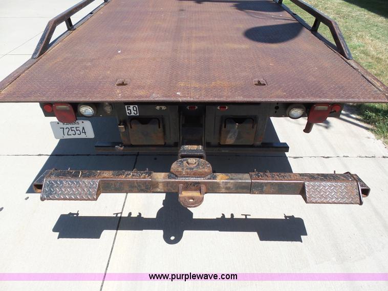 image for item J6031 1997 International 4700 rollback truck