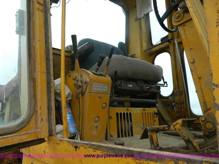 image for item J8875 1976 Caterpillar 140G motor grader