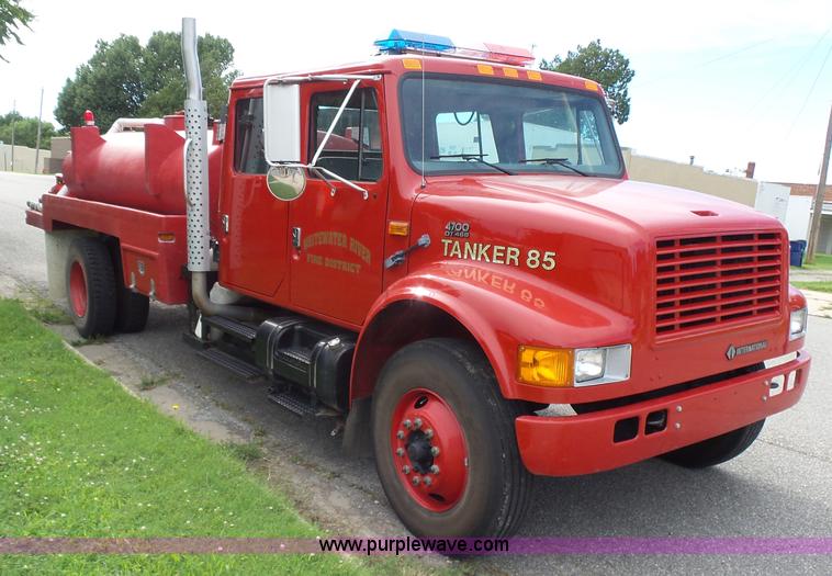image for item K3178 1997 International 4700 Crew Cab tanker fire truck