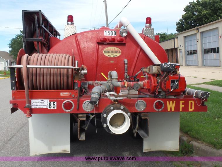 image for item K3178 1997 International 4700 Crew Cab tanker fire truck