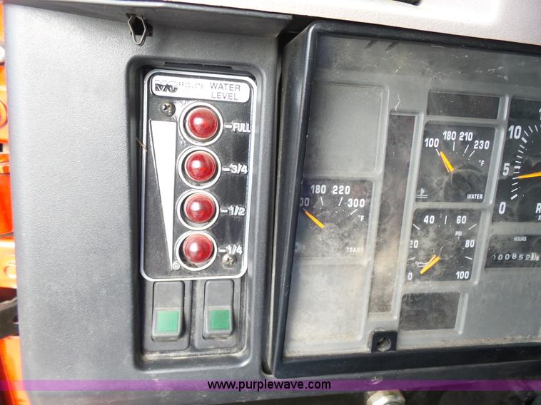 image for item K3178 1997 International 4700 Crew Cab tanker fire truck