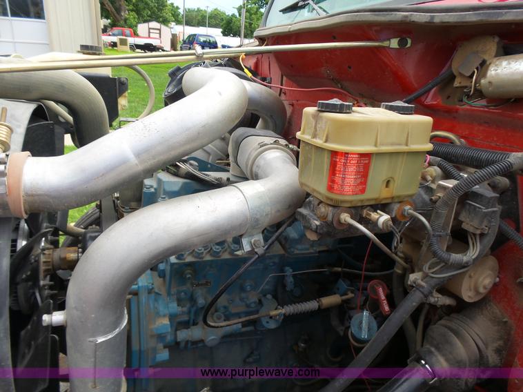 image for item K3178 1997 International 4700 Crew Cab tanker fire truck