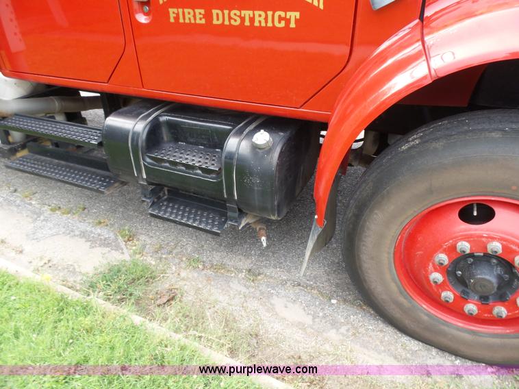 image for item K3178 1997 International 4700 Crew Cab tanker fire truck