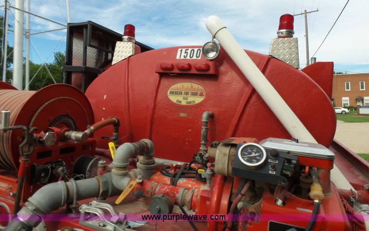 image for item K3178 1997 International 4700 Crew Cab tanker fire truck