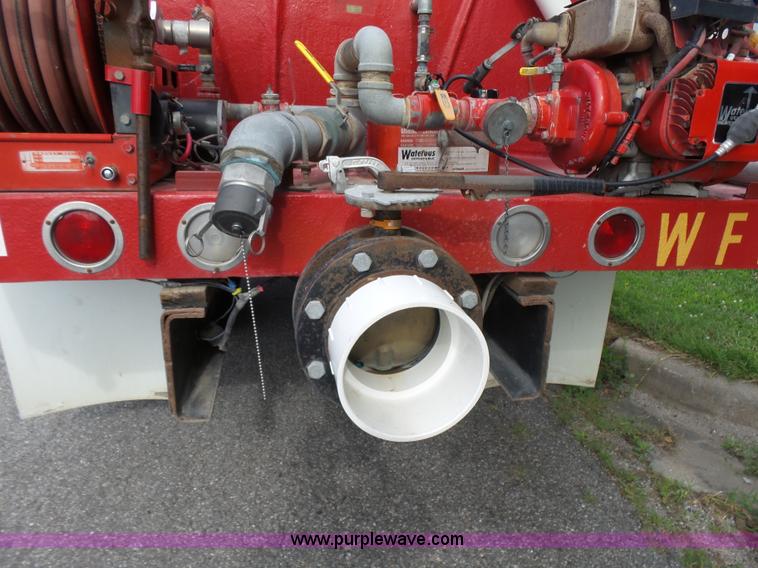 image for item K3178 1997 International 4700 Crew Cab tanker fire truck